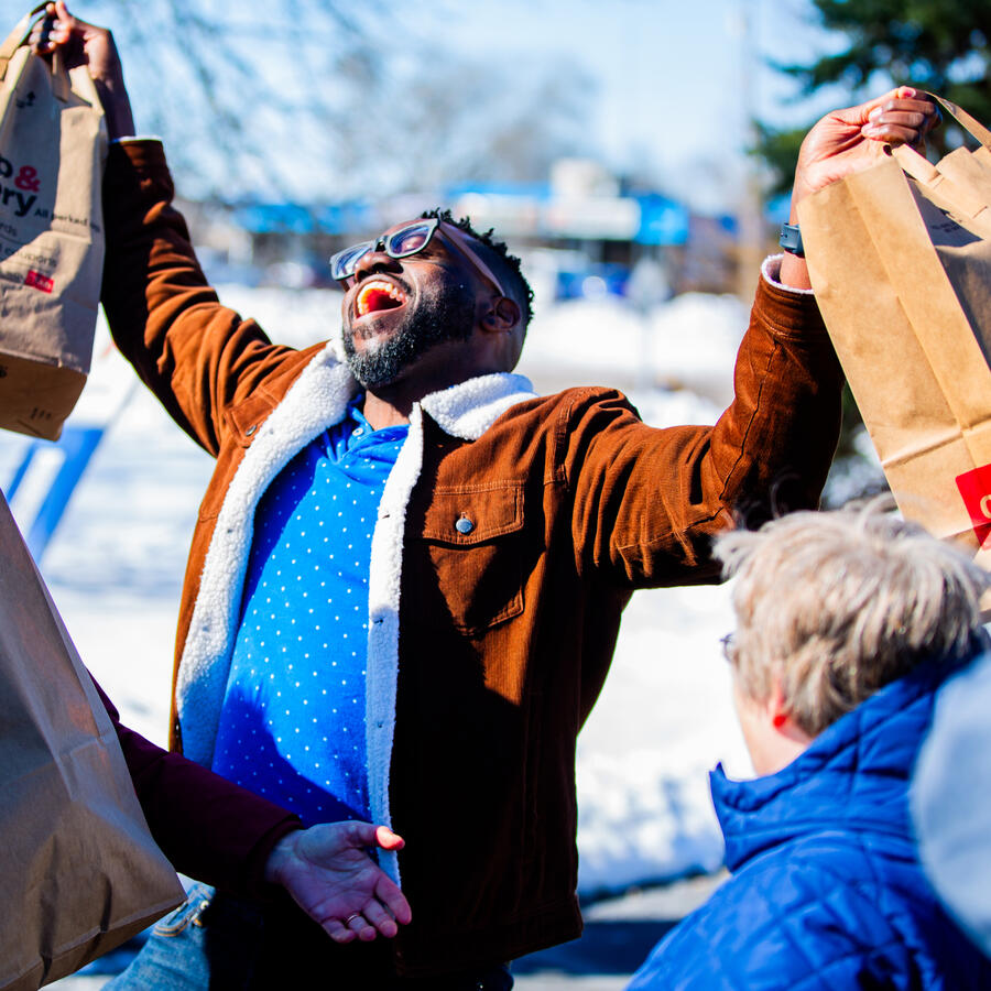 Jason Hackett collecting food for KARE 11&#39;s Food Fight 2024
